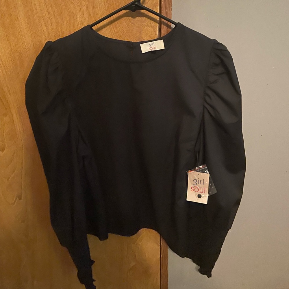Black wrist cuff dress top.